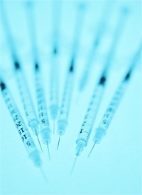 Syringe and needles.